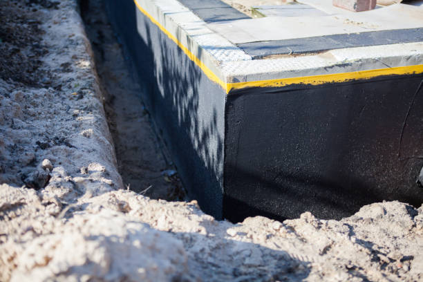 Professional Waterproofing technician working in Jewell, OH